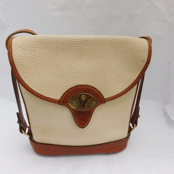 Dooney & Bourke Handbags - Dooney & Bourke Beige Tan Leather Saddle Bag